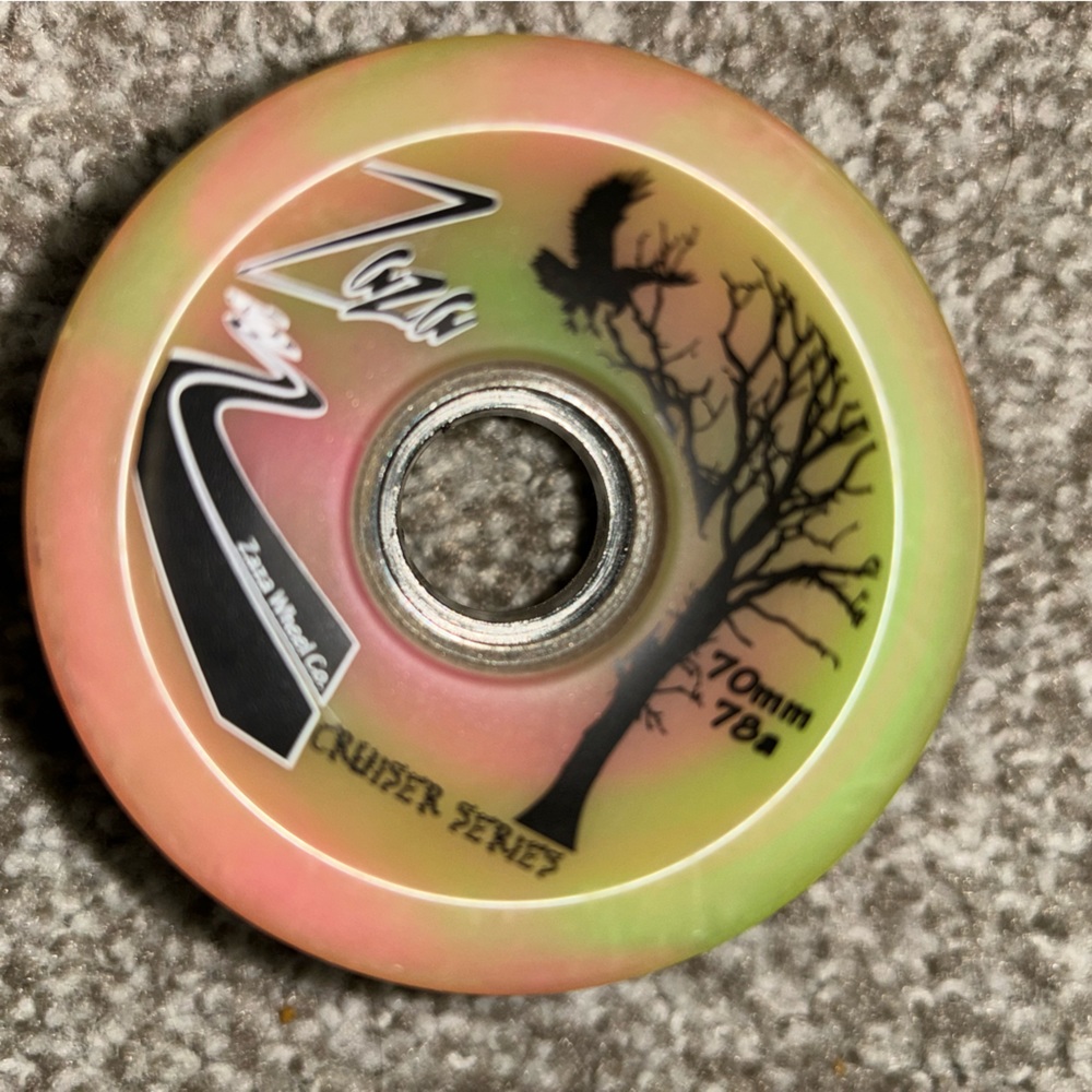 Green and pink 70 mm longboard wheels